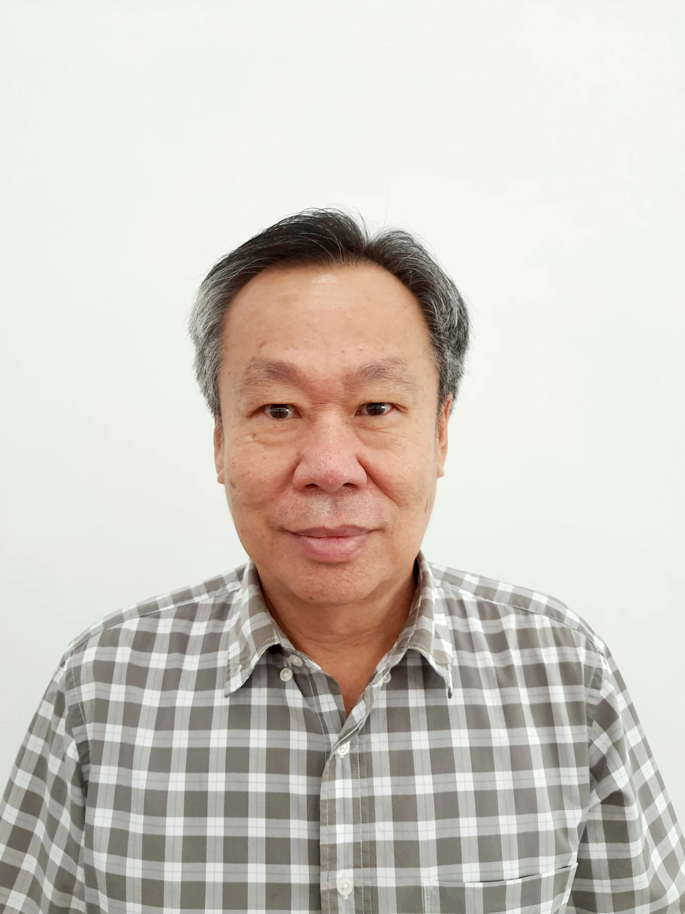 Portrait of KYS Steel founder and consultant Kong Yoke Ming