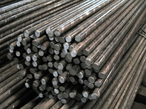 Close view of round steel bar bundles
