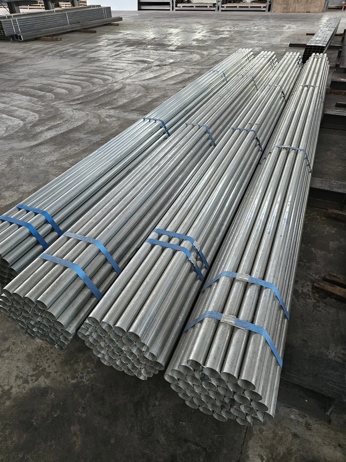 Steel channels, pipes and tracks in storage